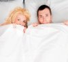 14054_stock-photo-funny-young-couple-in-a-bed-shutterstock_50693197_hf.jpg